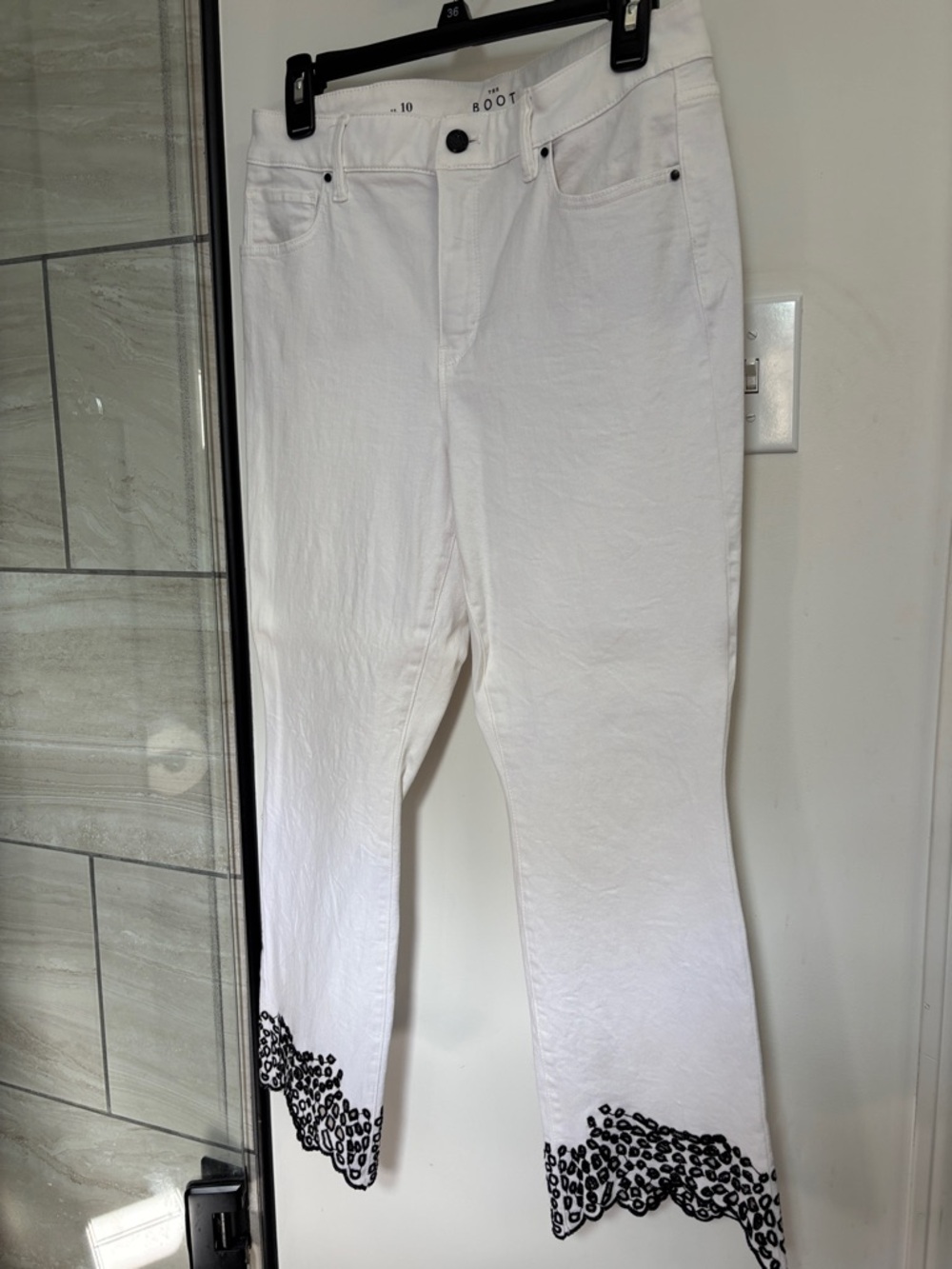 White House Black Market White Flare Jeans with Black Leopard Hem